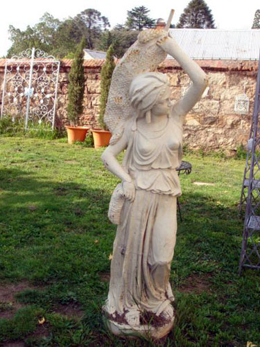 Large cast iron maiden with fishing net